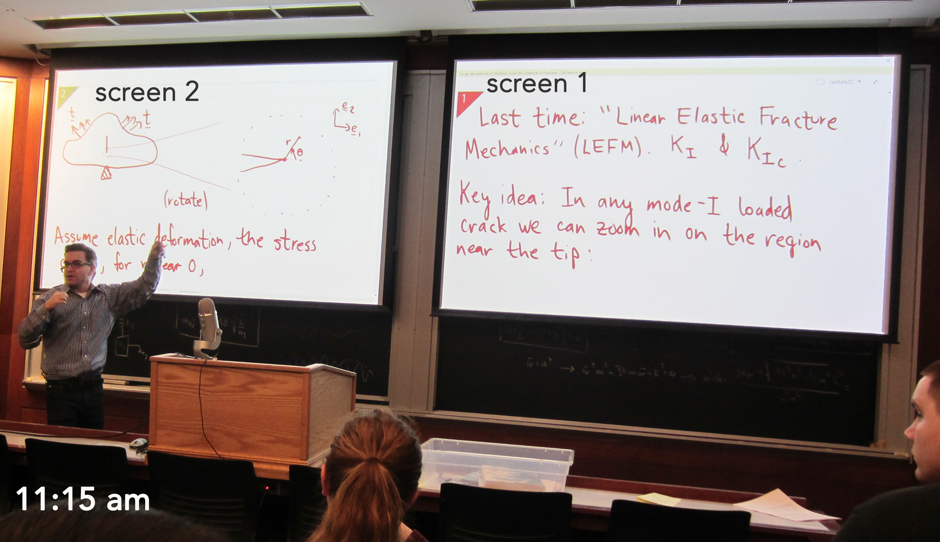 Photo of classroom with two projector screens