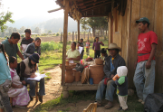 people gathered outside a home